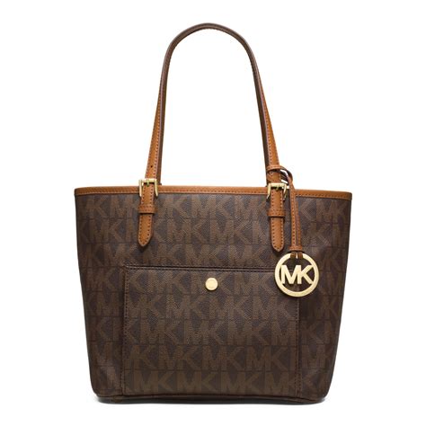 michael michael kors jet set medium logo tote bag|michael kors airplane print bag.